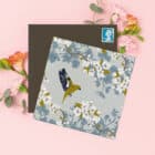 Illustrated birthday card with Blackbird for RSPB, 10% of sales go directly to the charity with blue plants behind. Happy birthday card, FSC sustainable RSPB greeting card pack hummingbird greenfinch long tailed tit art cards charity art pack