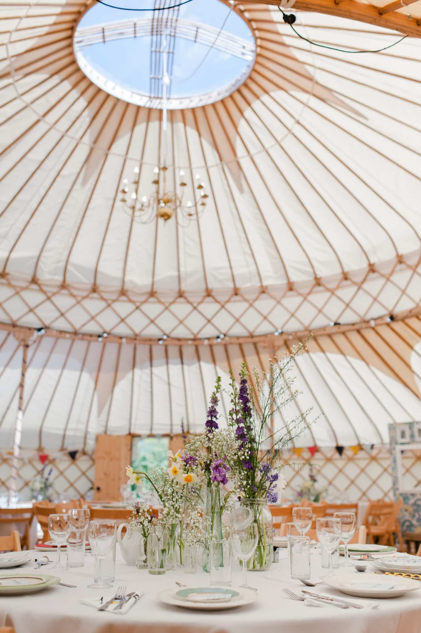 Lorna Syson handmade wedding with nature-inspired fabric details and colourful decorations