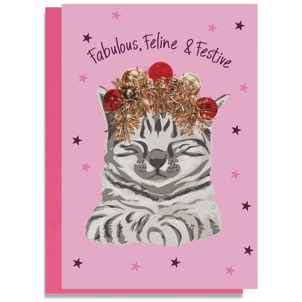 Fabulous, Feline & Festive Christmas card featuring a grey tabby wearing a tinsel and bauble crown on a pink background by lorna syson Fabulous, Feline & Festive Christmas card featuring a grey tabby wearing a tinsel and bauble crown on a pink background by lorna syson