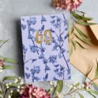 personalised 60th birthday card. Luxury designer greeting card with bluebell design. Bespoke cut out numbers
