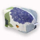 blue hydrangea wash bag with orange ladybirds, make up bag, toiletries bag, cosmetic bag, wash bag, made in the UK, 100% cotton, bird make up bag