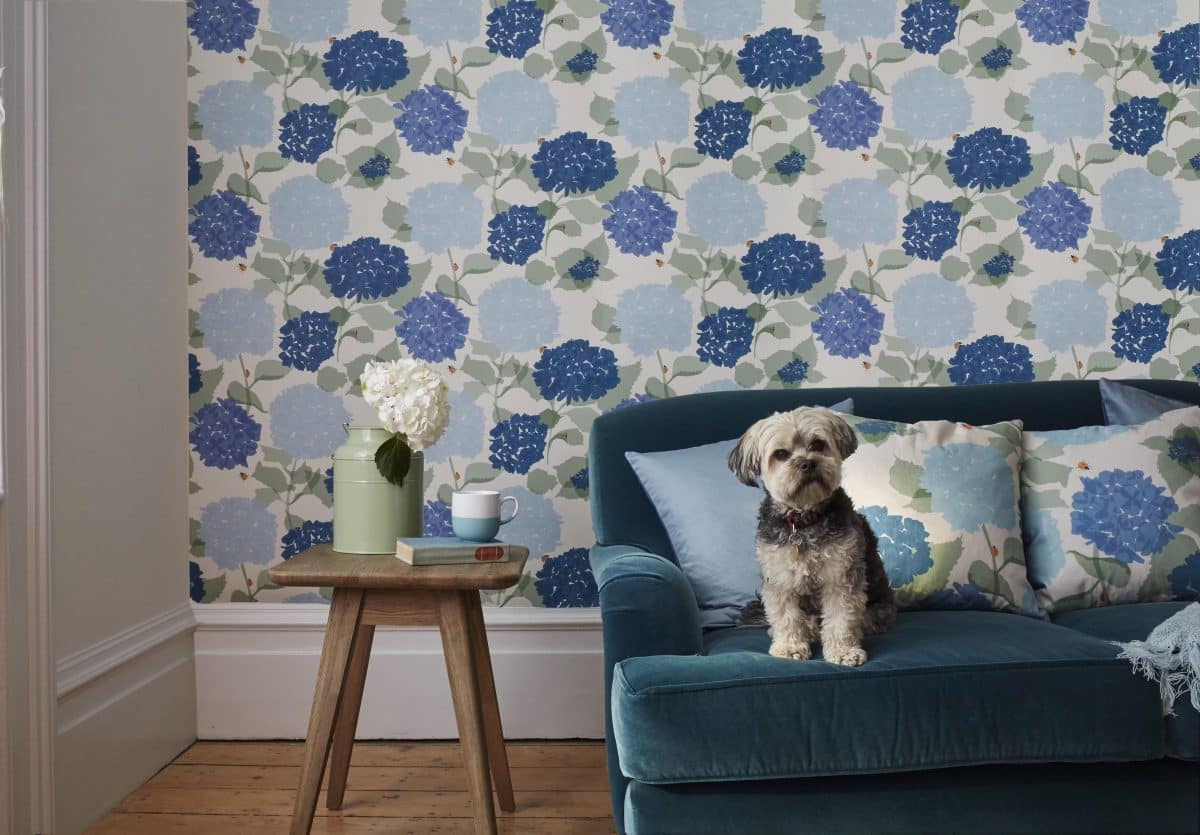 hydrangea cushion and wallpaper with havenese dog sustainable lorna syson floral wallpaper with sofa.com sofa